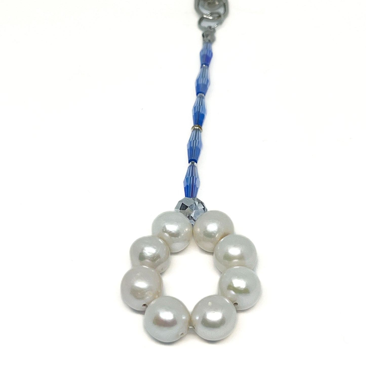 Close up of 10mm AAA Quality Freshwater Cultured Pearl Key Tag featuring a circle of 8 stunning pearls on white background