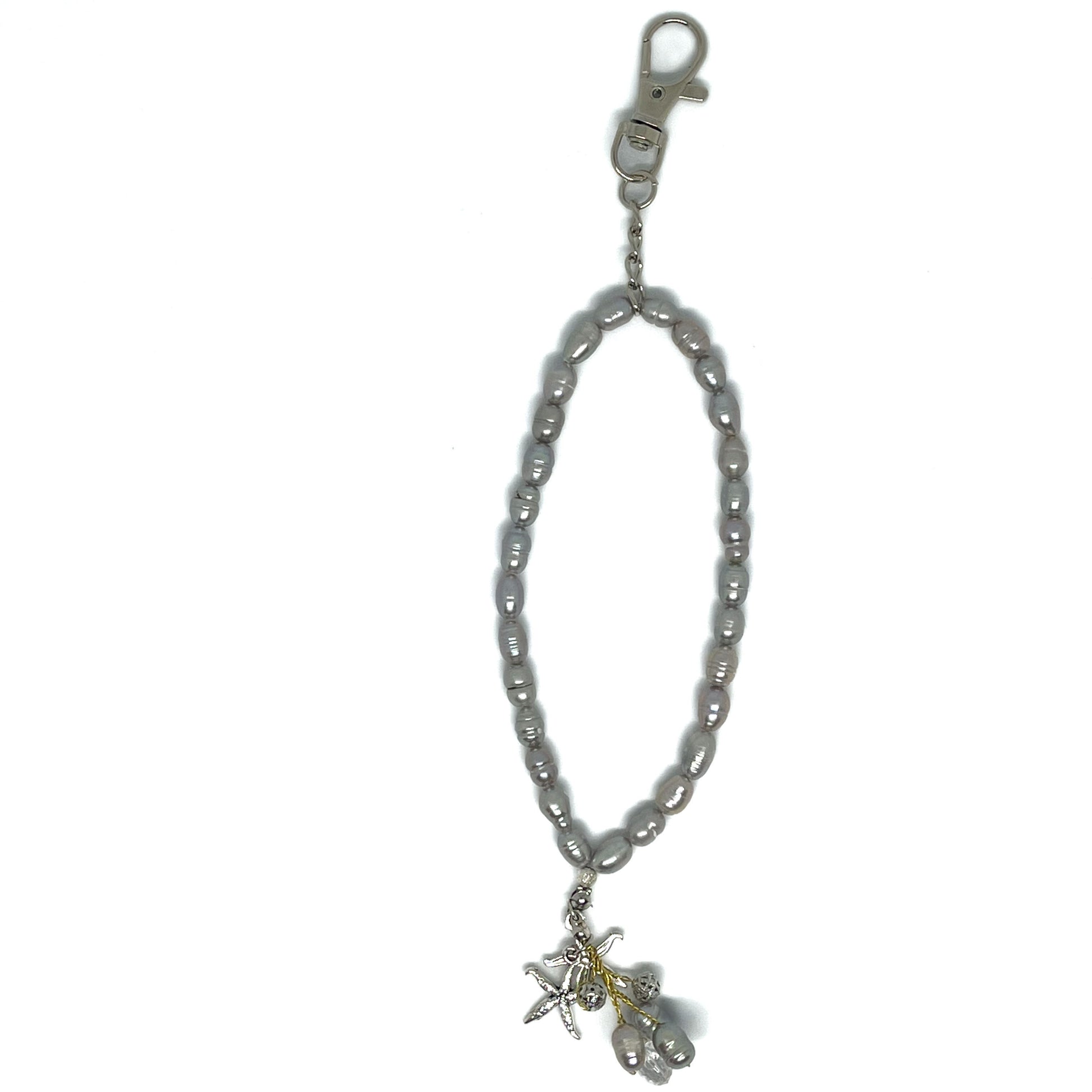 Genuine Lombok Freshwater Pearl Phone Strap - Elegant Silver Handmade Wristlet (21cm). Original Design & One of a kind featuring a pair of starfish viewed from above.