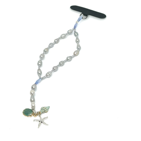 enuine Lombok Freshwater Pearl Phone Strap - Elegant Silver Handmade Wristlet (21cm). Original Design & One of a kind featuring 3 Sea Trinkets