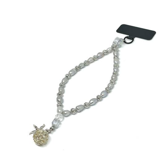 Front right view of a Genuine Lombok Freshwater Pearl Phone Strap - Elegant Silver Handmade Wristlet (17cm). Original Design & One of a kind featuring a starfish and silver ball